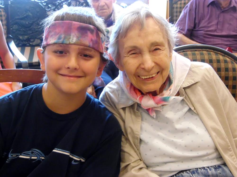 Young Man and Senior Resident enjoy Intergenerational Music Camp at Parc Provence