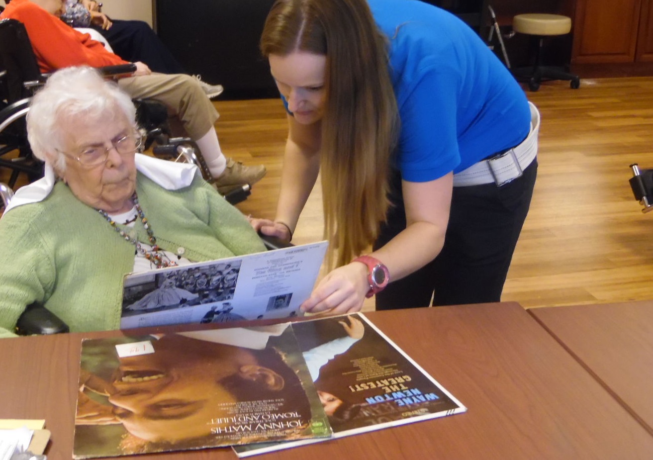 Activities Assistant with resident in music therapy