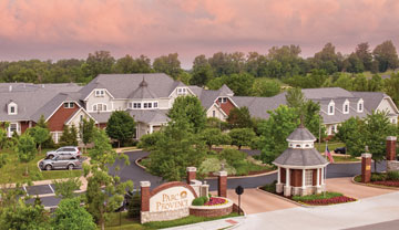 Aerial view of the Parc Provence campus with a sunset