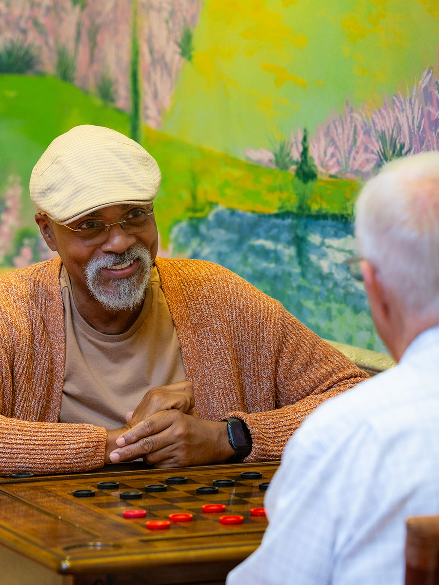 Residents playing checkers.