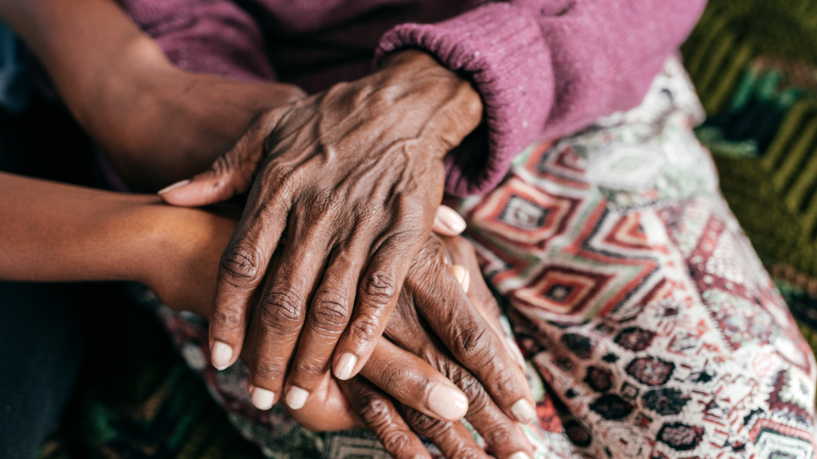 young hands and old hands.